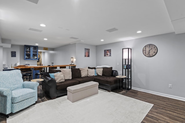 114 Dean Rd, East Lyme, CT 06333 - living area featuring wet bar, dark wood-style flooring, recessed lighting, and baseboards