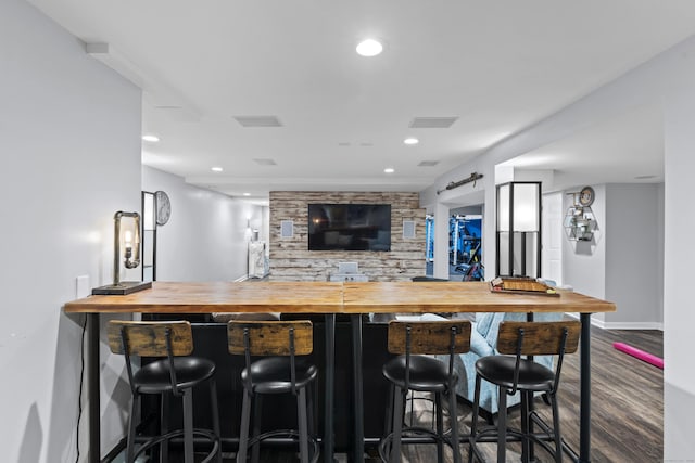 114 Dean Rd, East Lyme, CT 06333 - indoor wet bar with wood finished floors, baseboards, and recessed lighting