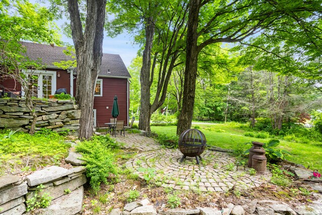 8 Cider Mill Rd, Tolland, CT 06084 - view of yard featuring a fire pit and a patio area