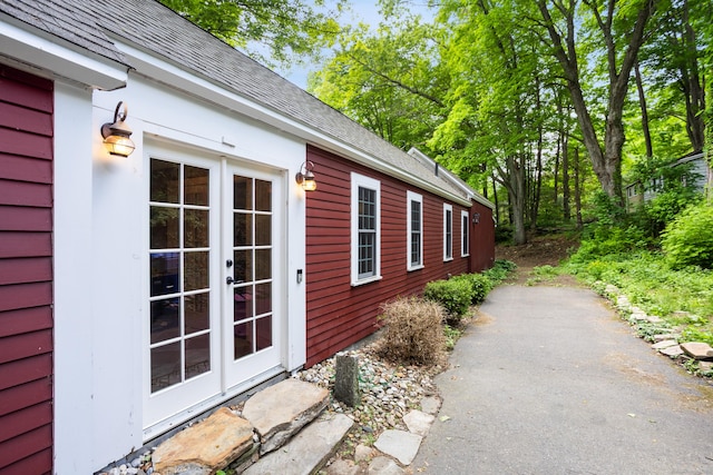 8 Cider Mill Rd, Tolland, CT 06084 - view of home's exterior with roof with shingles and french doors