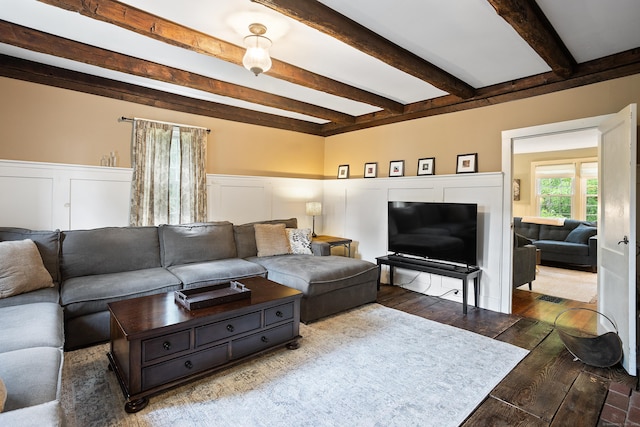 8 Cider Mill Rd, Tolland, CT 06084 - living area with beam ceiling, hardwood / wood-style flooring, a decorative wall, and wainscoting