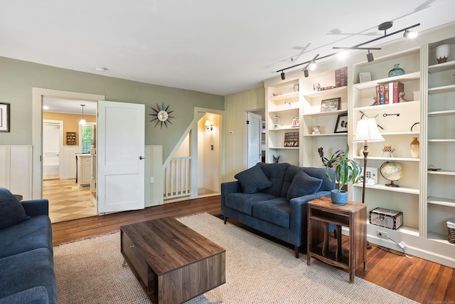 8 Cider Mill Rd, Tolland, CT 06084 - living room featuring wood finished floors and rail lighting
