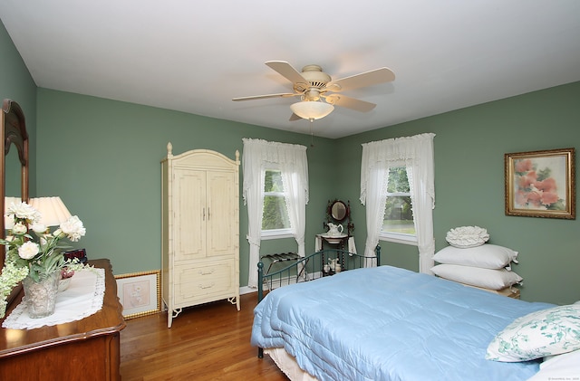 202 Wilson Rd, Orange, CT 06477 - bedroom with wood finished floors and a ceiling fan