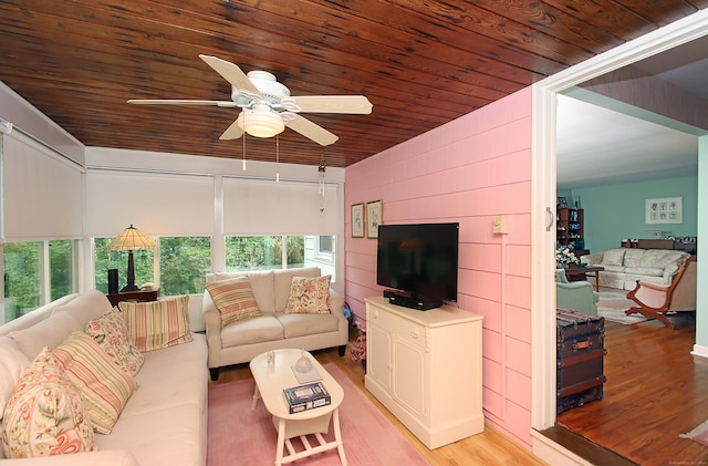 202 Wilson Rd, Orange, CT 06477 - living room featuring light wood-style flooring, healthy amount of natural light, ceiling fan, and wooden ceiling