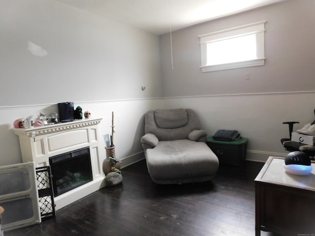 157 Madison Ter, Bridgeport, CT 06606 - living area with wood finished floors, a fireplace, and baseboards