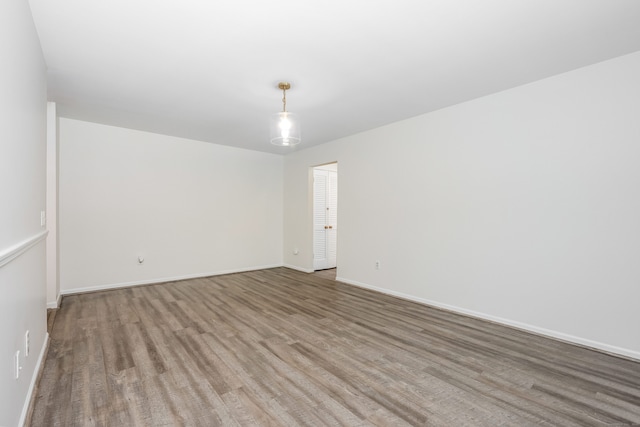 125 Warner Hill Rd Unit 74, Stratford, CT 06614 - empty room with wood finished floors and baseboards