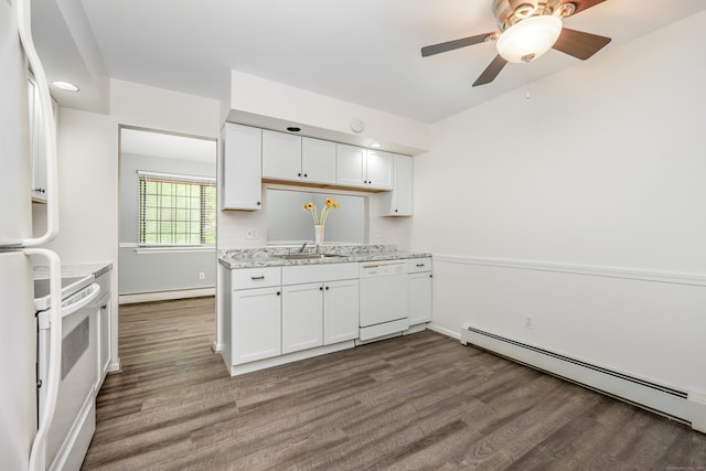 125 Warner Hill Rd Unit 74, Stratford, CT 06614 - kitchen featuring white appliances, baseboard heating, a sink, a baseboard radiator, and white cabinets