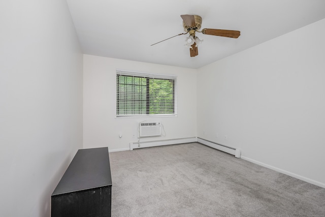 125 Warner Hill Rd Unit 74, Stratford, CT 06614 - carpeted empty room featuring a wall unit AC, a ceiling fan, and baseboards