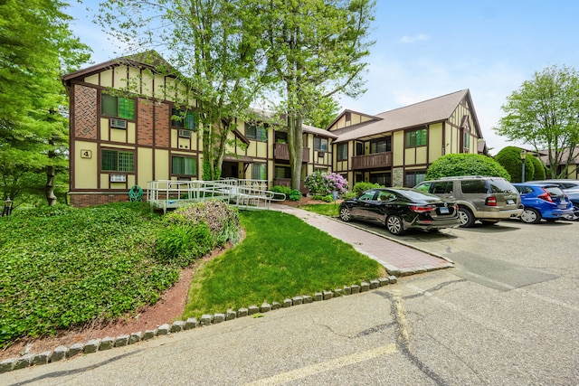 125 Warner Hill Rd Unit 74, Stratford, CT 06614 - view of property featuring uncovered parking