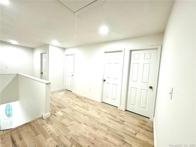 277 Trumbull Ave, Bridgeport, CT 06606 - empty room with light wood-type flooring, attic access, recessed lighting, and baseboards