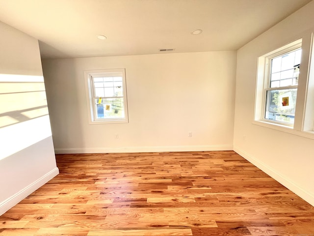 277 Trumbull Ave, Bridgeport, CT 06606 - empty room with light wood-type flooring, baseboards, and recessed lighting
