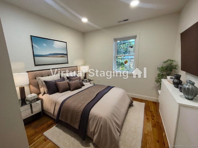 277 Trumbull Ave, Bridgeport, CT 06606 - bedroom with wood finished floors, recessed lighting, and baseboards
