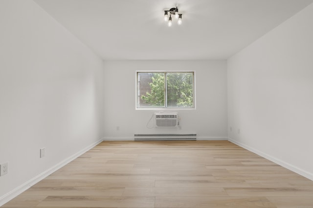 79 Claudia Dr Apt 254, West Haven, CT 06516 - empty room featuring light wood-style floors, baseboards, and an AC wall unit