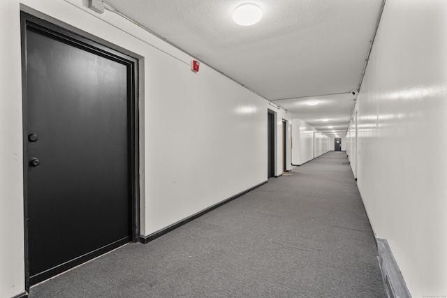 79 Claudia Dr Apt 254, West Haven, CT 06516 - hall with carpet floors and a textured ceiling