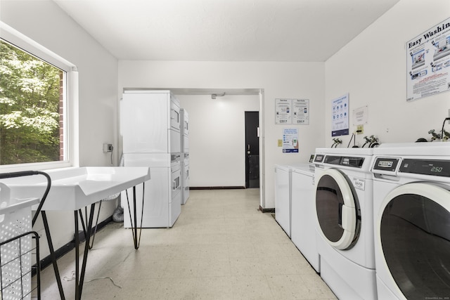 79 Claudia Dr Apt 254, West Haven, CT 06516 - community laundry room featuring stacked washing machine and dryer, washer and dryer, and light floors