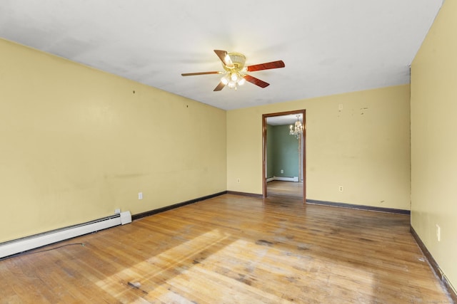 130 Jefferson Ln, East Hartford, CT 06118 - unfurnished room with a baseboard radiator, a ceiling fan, wood finished floors, and baseboards