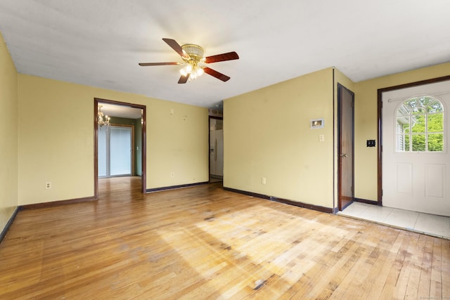 130 Jefferson Ln, East Hartford, CT 06118 - unfurnished room featuring light wood-style floors, a ceiling fan, and baseboards