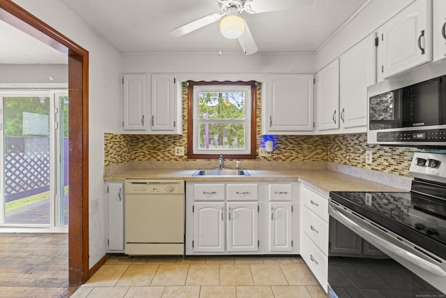 130 Jefferson Ln, East Hartford, CT 06118 - kitchen with stainless steel appliances, a sink, white cabinetry, a ceiling fan, and light countertops