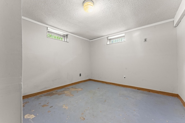 130 Jefferson Ln, East Hartford, CT 06118 - basement with baseboards and a textured ceiling