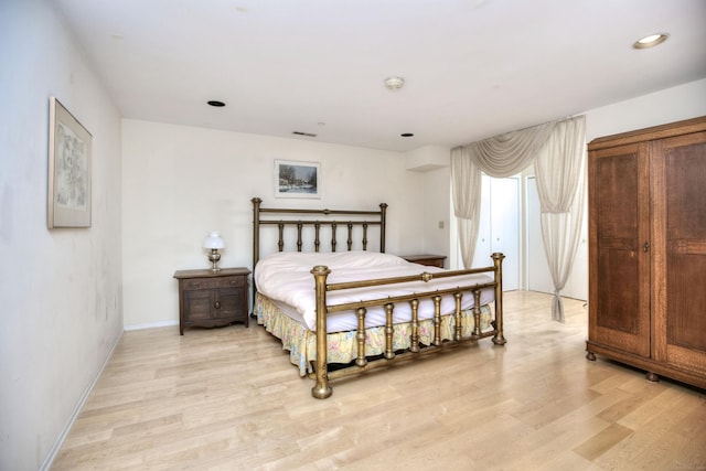 26 Cove Ave Apt 3B, Norwalk, CT 06855 - bedroom featuring light wood-type flooring, baseboards, and recessed lighting