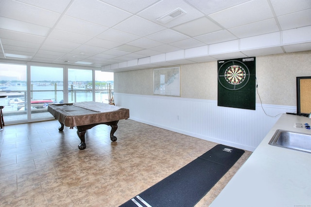 26 Cove Ave Apt 3B, Norwalk, CT 06855 - game room with a paneled ceiling, a wainscoted wall, a sink, a water view, and pool table