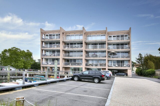 26 Cove Ave Apt 3B, Norwalk, CT 06855 - view of apartment building / complex with uncovered parking