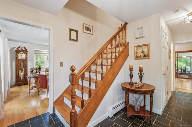 33 Cold Spring Rd, Avon, CT 06001 - stairs with a baseboard radiator and baseboards