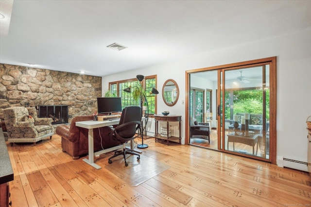 33 Cold Spring Rd, Avon, CT 06001 - office space featuring hardwood / wood-style floors, a fireplace, and baseboard heating