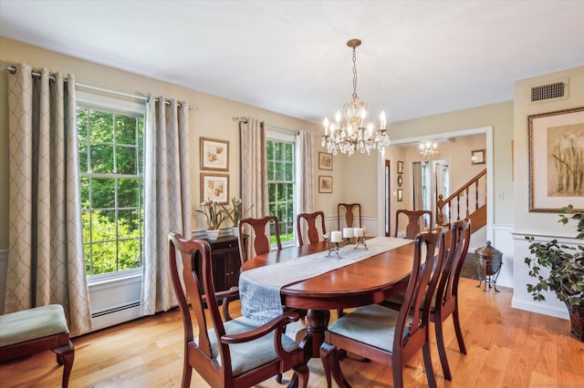 33 Cold Spring Rd, Avon, CT 06001 - dining space with a chandelier, healthy amount of natural light, and light wood-style flooring