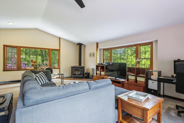 33 Cold Spring Rd, Avon, CT 06001 - carpeted living room with a wood stove, lofted ceiling, and ceiling fan