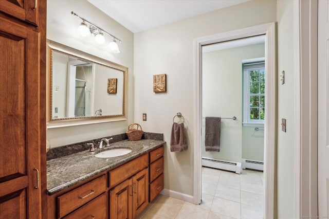 33 Cold Spring Rd, Avon, CT 06001 - bathroom featuring a baseboard heating unit, vanity, tile patterned flooring, and baseboards