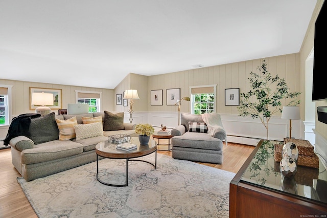 15 Stony Cors, Avon, CT 06001 - living area featuring a decorative wall, wood finished floors, and a baseboard heating unit