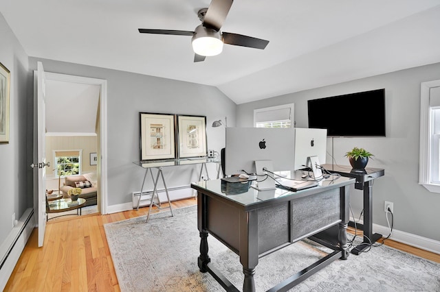 15 Stony Cors, Avon, CT 06001 - home office featuring a baseboard heating unit, vaulted ceiling, a ceiling fan, and light wood-style floors