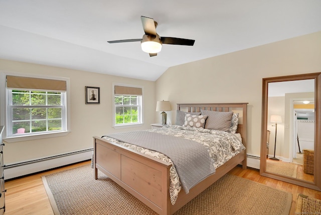 15 Stony Cors, Avon, CT 06001 - bedroom with a baseboard radiator, light wood-style flooring, vaulted ceiling, and a ceiling fan