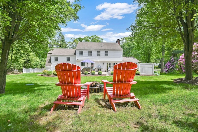 15 Stony Cors, Avon, CT 06001 - back of house with a fire pit and a chimney
