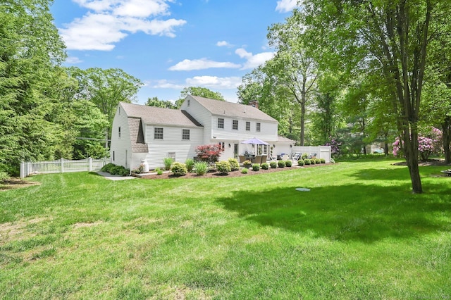 15 Stony Cors, Avon, CT 06001 - back of property with a chimney and roof with shingles