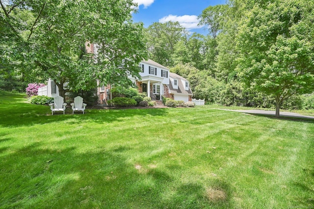 15 Stony Cors, Avon, CT 06001 - view of front of home with a front yard and an attached garage