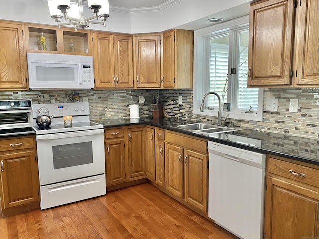10 Richards Ave, Seymour, CT 06483 - kitchen with white appliances, a sink, ornamental molding, dark countertops, and decorative backsplash