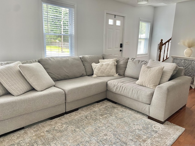 10 Richards Ave, Seymour, CT 06483 - living area with healthy amount of natural light and wood finished floors