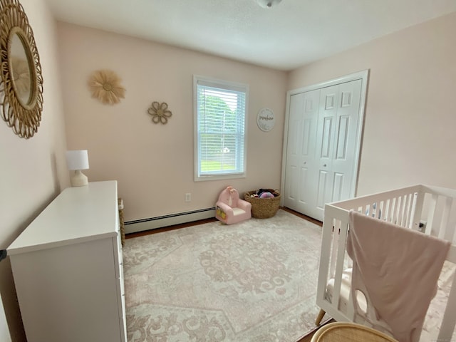 10 Richards Ave, Seymour, CT 06483 - bedroom with a baseboard heating unit and a closet