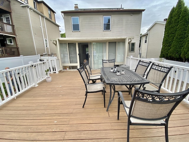 10 Richards Ave, Seymour, CT 06483 - wooden deck with outdoor dining space and a sunroom