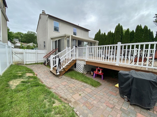 10 Richards Ave, Seymour, CT 06483 - back of house featuring a deck, a fenced backyard, a patio area, and a chimney