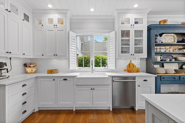 5 Oakleigh Ct, Norwalk, CT 06853 - kitchen with dishwasher, a sink, backsplash, crown molding, and white cabinets