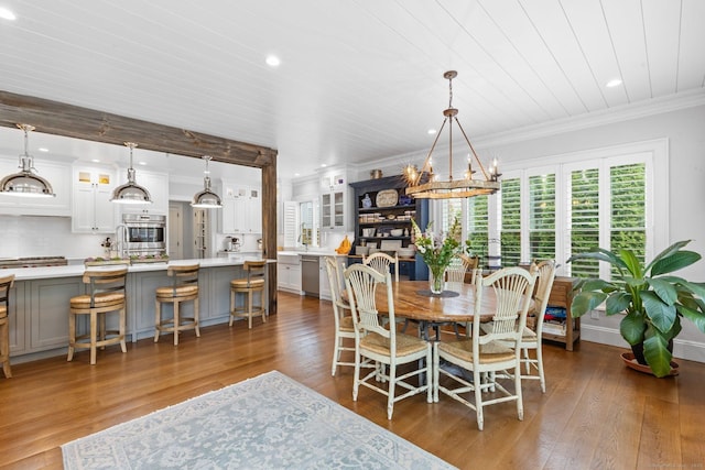 5 Oakleigh Ct, Norwalk, CT 06853 - dining space with a chandelier, recessed lighting, crown molding, and wood-type flooring