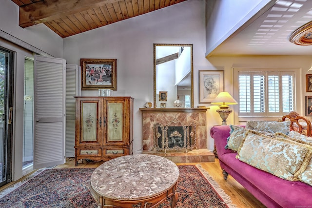 515 Opa Ln Unit B, Stratford, CT 06614 - living room with lofted ceiling, wood finished floors, a fireplace, and wood ceiling