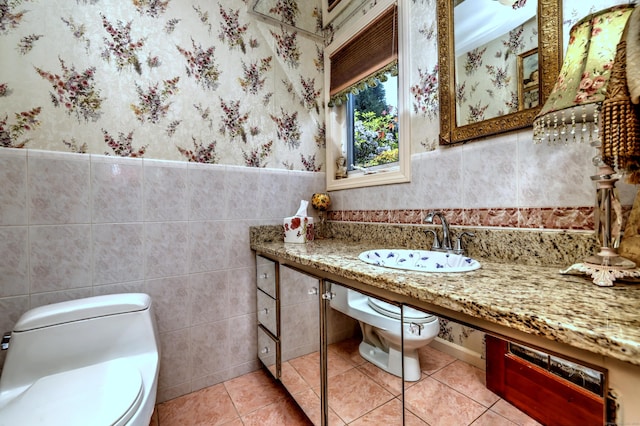 515 Opa Ln Unit B, Stratford, CT 06614 - bathroom with tile walls, wainscoting, tile patterned flooring, and wallpapered walls