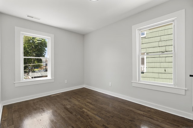 17 May St, Ansonia, CT 06401 - unfurnished room featuring dark wood-type flooring and baseboards