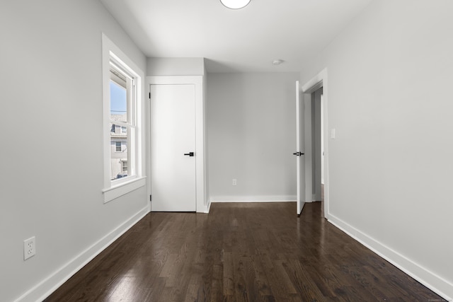 17 May St, Ansonia, CT 06401 - spare room featuring dark wood finished floors and baseboards