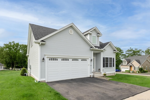 100 Silver Island Way Unit 100, Berlin, CT 06037 - traditional-style house with driveway, a shingled roof, a front yard, and central AC