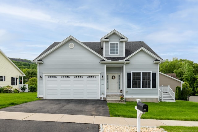 100 Silver Island Way Unit 100, Berlin, CT 06037 - traditional-style house featuring asphalt driveway, roof with shingles, a front yard, and a garage